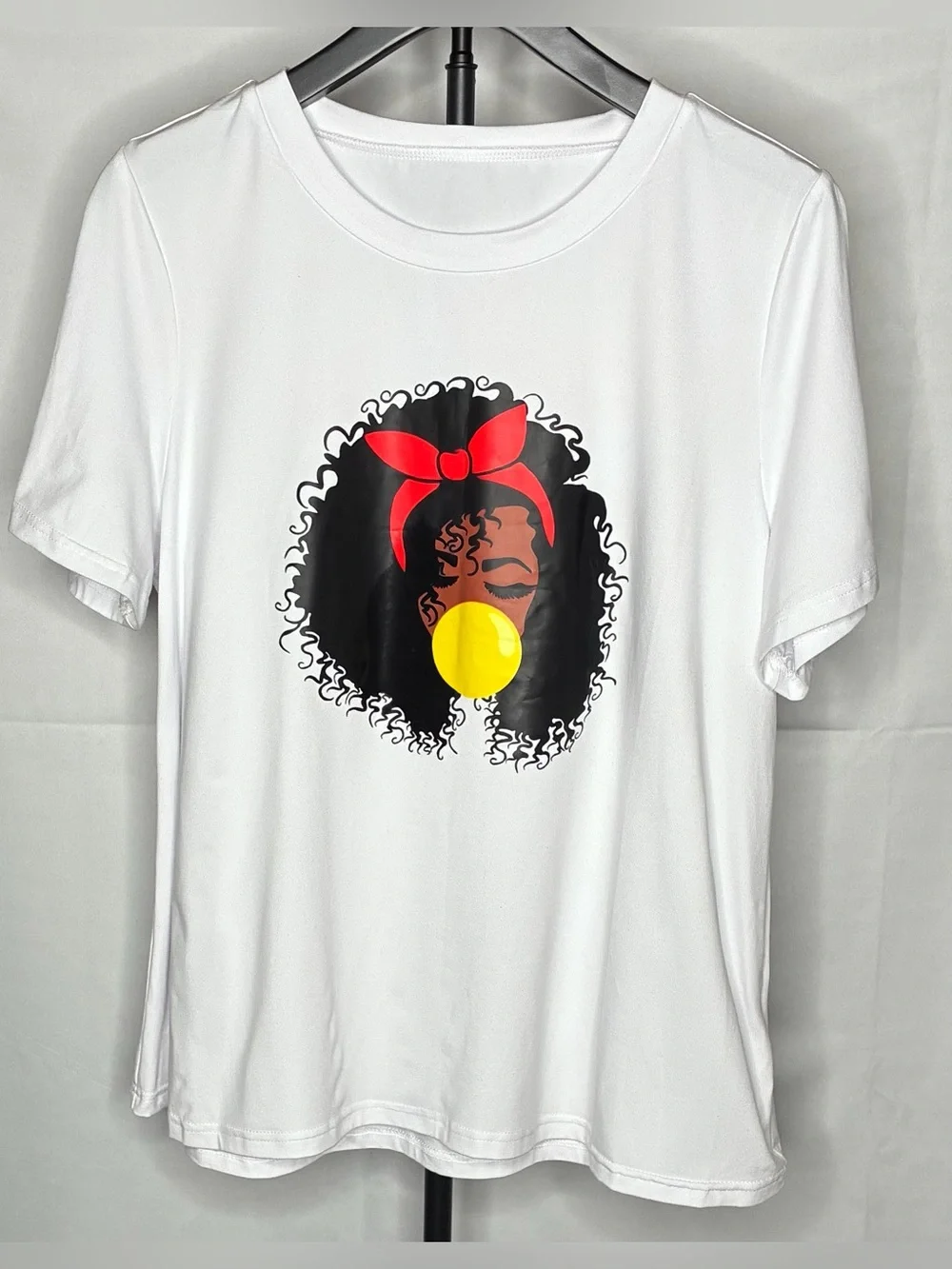 Women’s White Graphic Tee with Red Headband and Yellow Accent